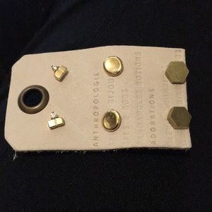 Three pairs of Madewell gold tone studs. One is Demi fine.
